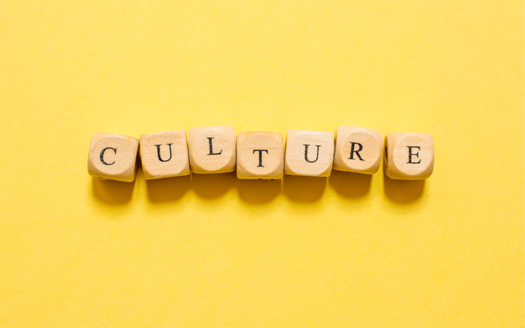 Yellow background with Scrabble letters spelling out ' Culture'